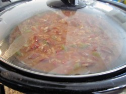 Simmering the stew after adding all ingredients Simmering the stew after adding all ingredients