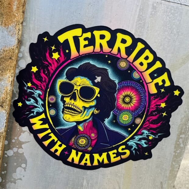 Psychedelic sticker design. A skull wearing shades look up among a field of bright flowers. Around the edge are the words: Terrible with Names.